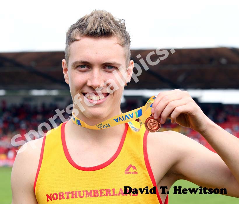 Scott Hall (Northumberland) with his bronze medal in the senior boys triple jump.